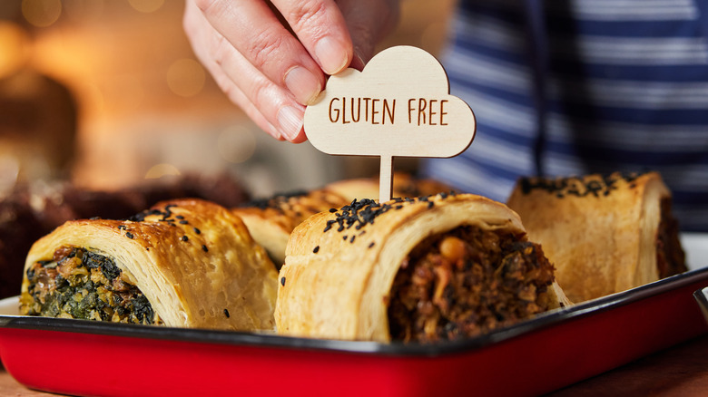 Gluten-free sign inserted into savory rolls