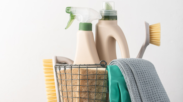 a basket of natural cleaning products