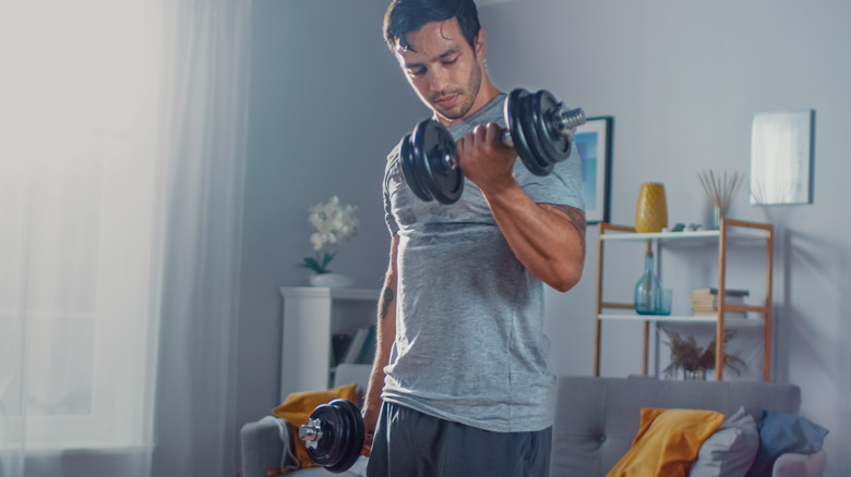 Man doing dumbbell curl