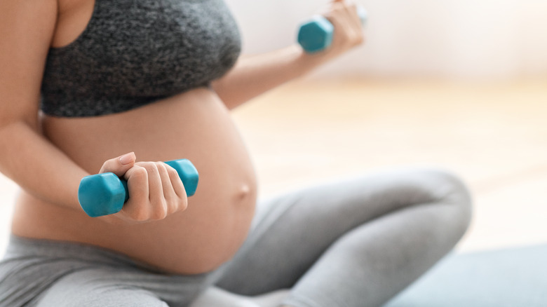 Pregnant woman exercising