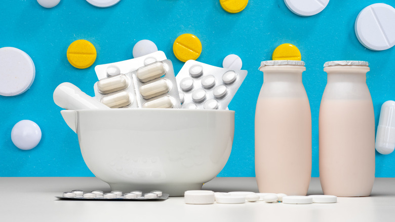 bowl of probiotic supplements with yogurt