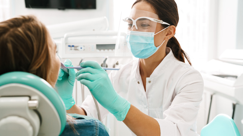 dentist with patient