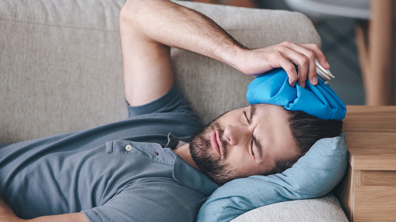 Man with ice pack on his head