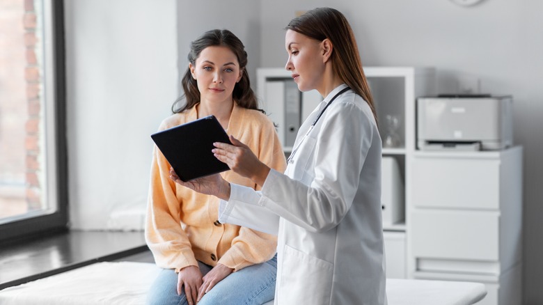 doctor consulting with patient