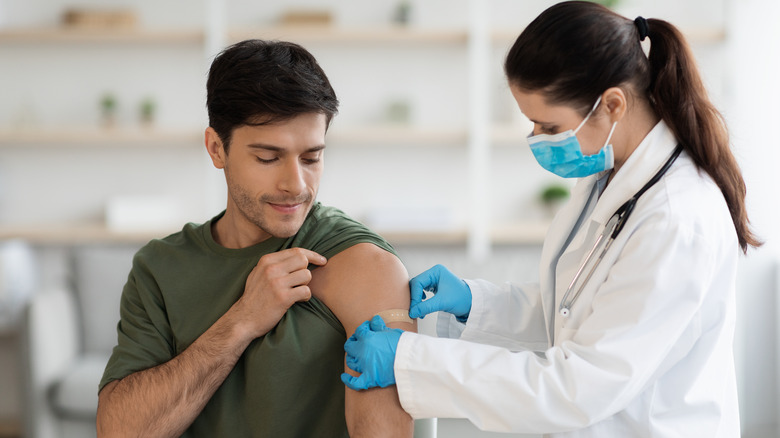 man getting vaccinated