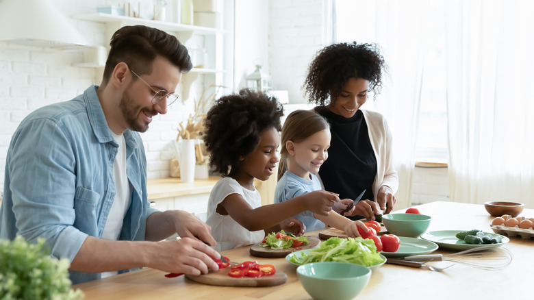 a family preparing a healthy meal 