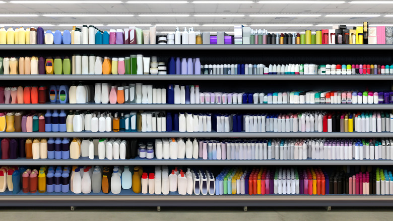 A skin care aisle filled with unlabeled products 