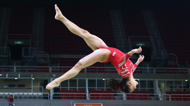 Laurie Hernandez performing on balance beam