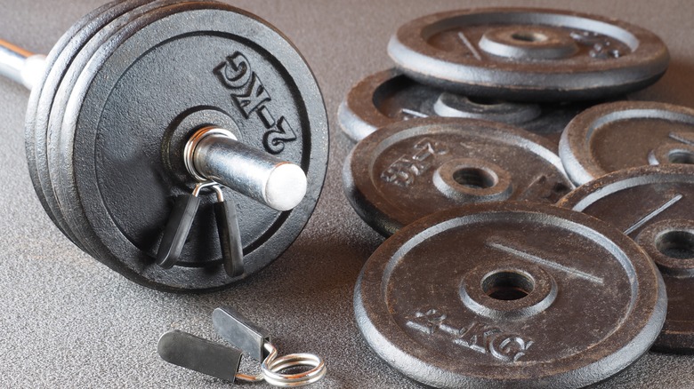 barbell and set of weight plates