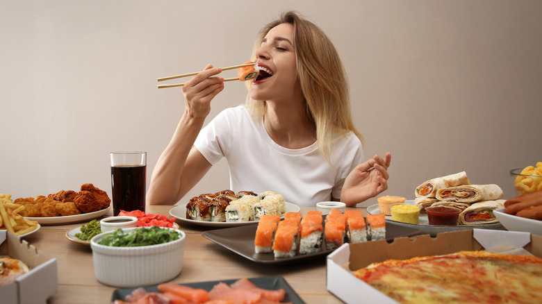 Woman eating a lot