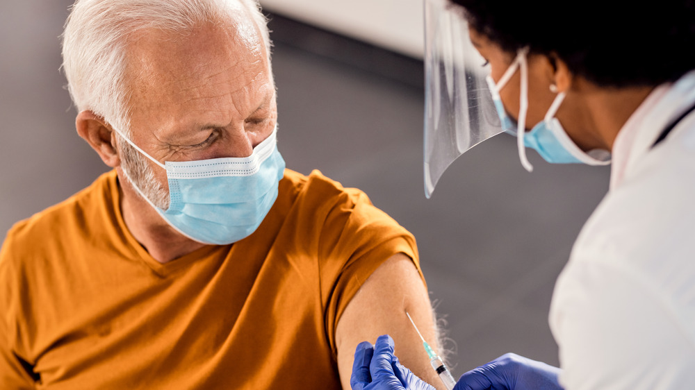 Older man getting vaccinated 