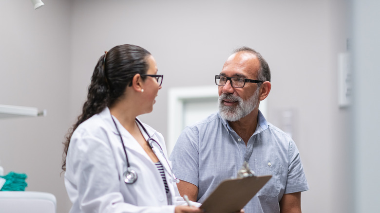 man talking with doctor about BPH