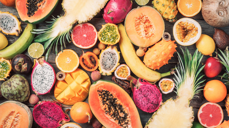 Sliced fruits on wooden table