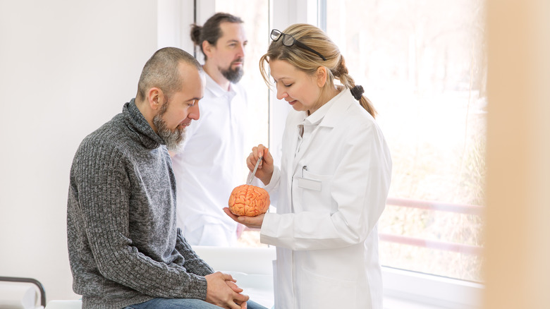 Neurologist talking to a stroke patient