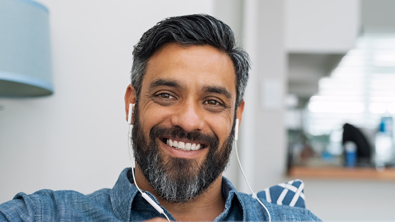 close-up of happy man smiling