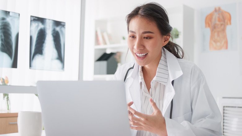 female doctor on video call