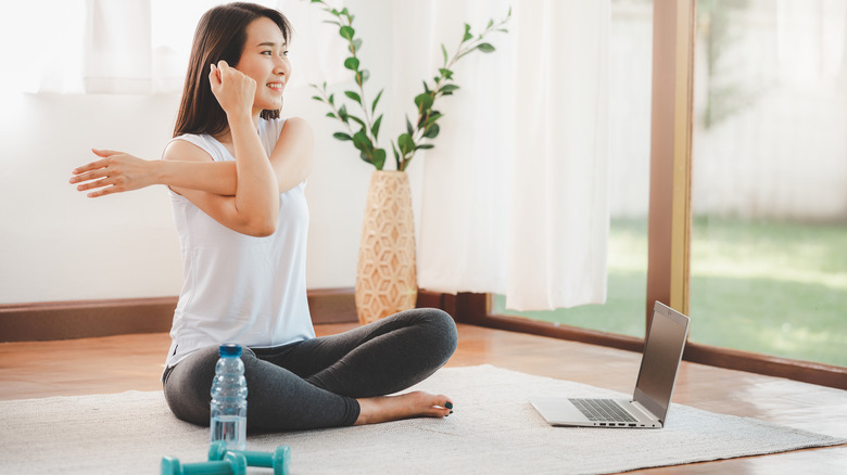 Woman stretching after workout 