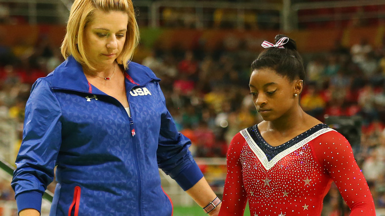 Simone Biles and her coach