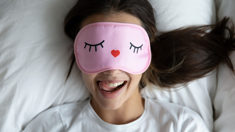 woman in eye mask