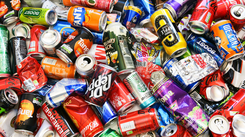 Empty cans of soda piled together