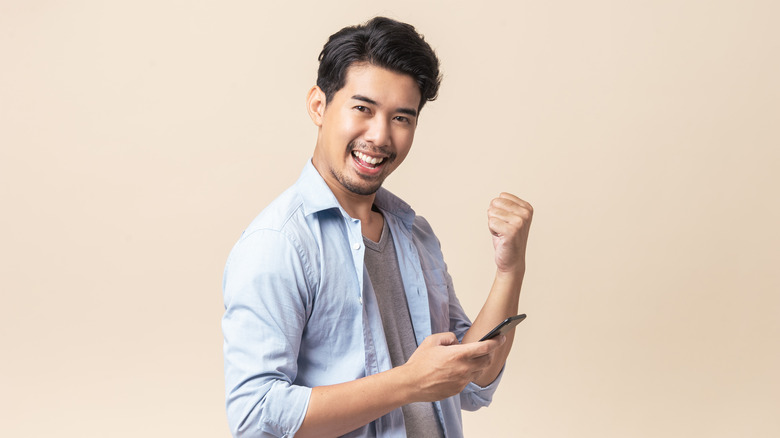 smiling man with phone 