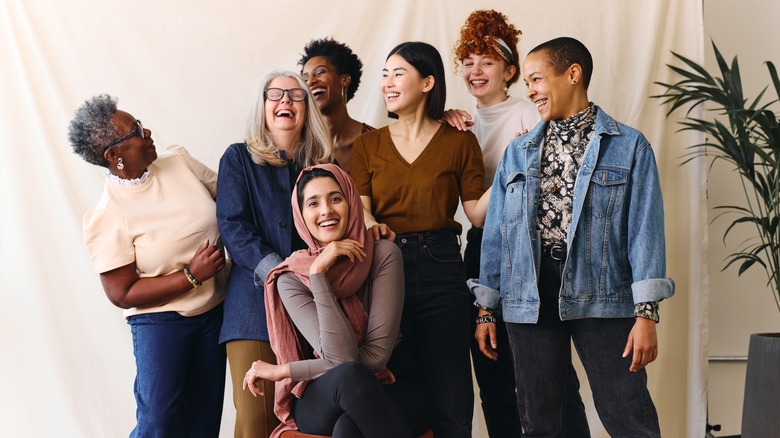 group of women laughing and smiling