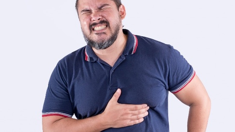 Man with acid reflux pain