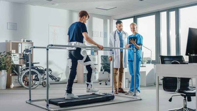 man on physical therapy treadmill