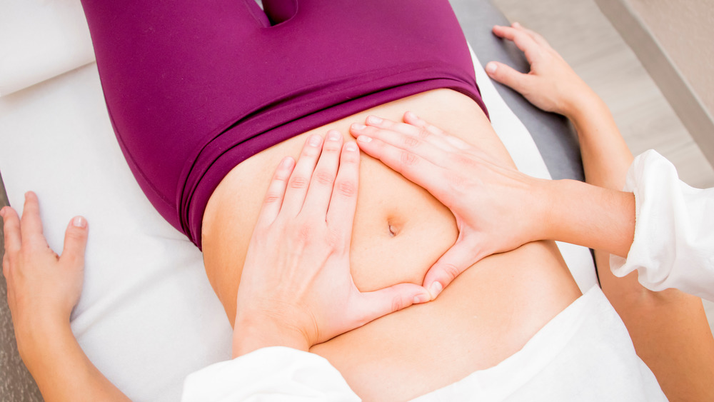 woman having abdominal massage