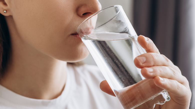 Woman drinking a glass of water