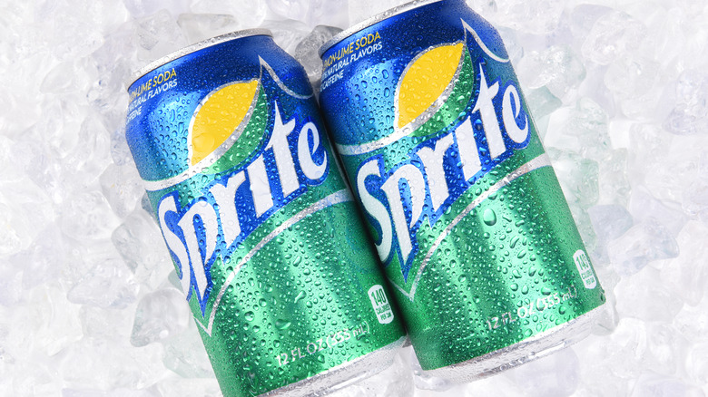 two cans of Sprite