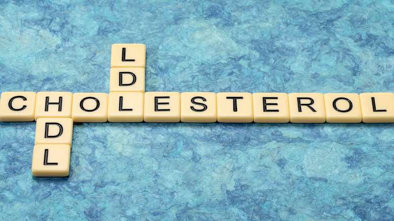 "cholesterol," "LDL", and HDL" scrabble tiles