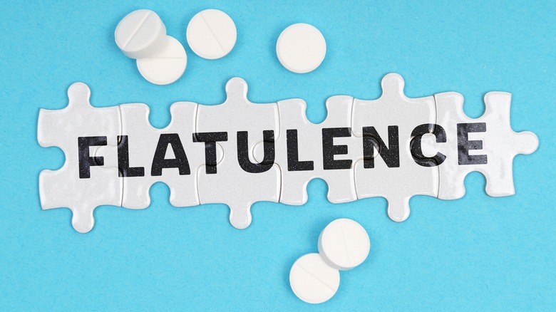 Puzzle pieces spelling out "flatulence" 