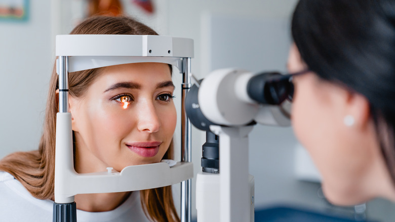 woman getting eye exam