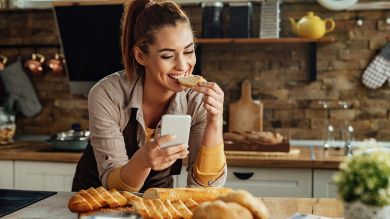 woman eating bread