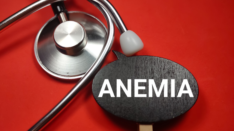 Anemia on wooden board with stethoscope