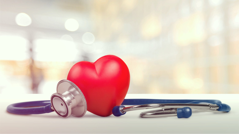 A stethoscope around a heart