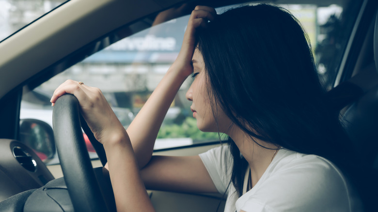 woman driving hangover