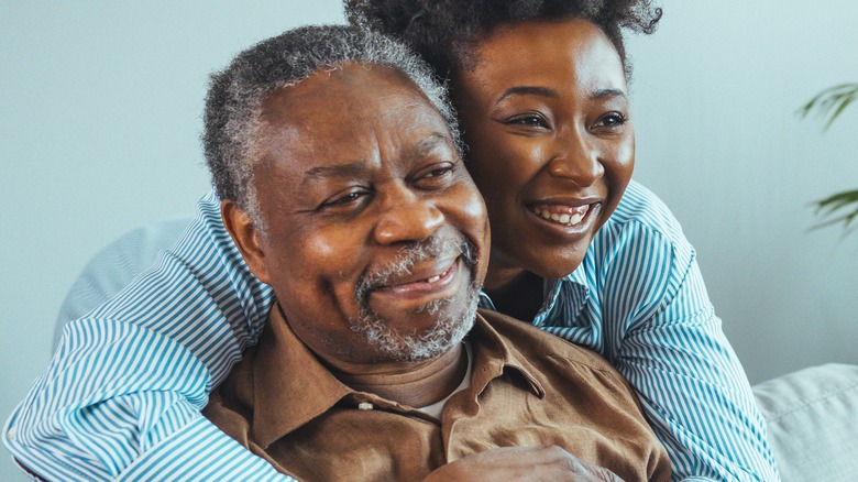 father and daughter embracing