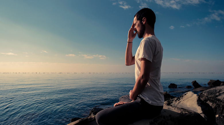 man breathing ocean