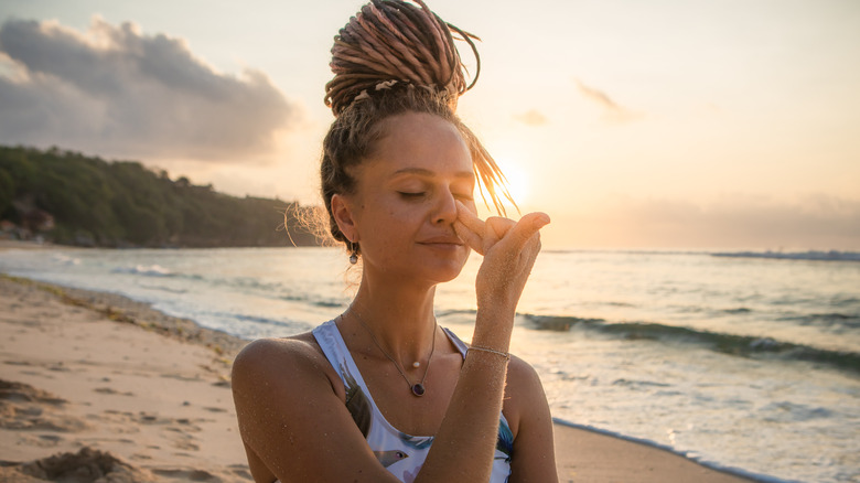 woman breathwork outdoors