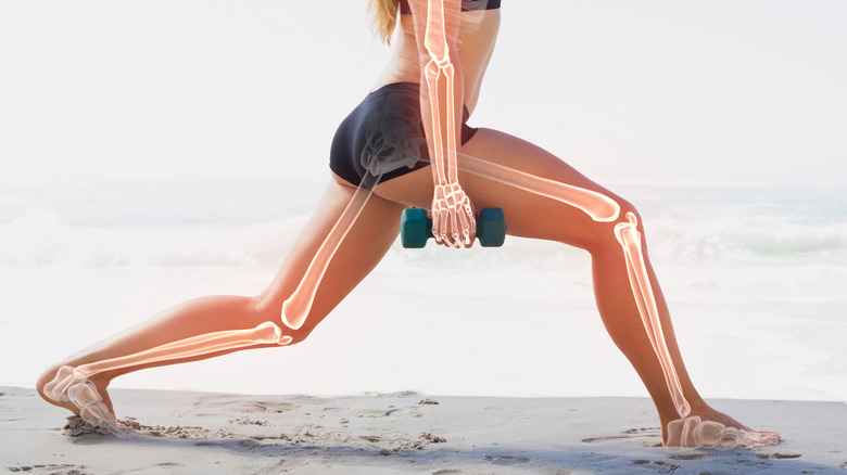 lunging girl with skeleton showing