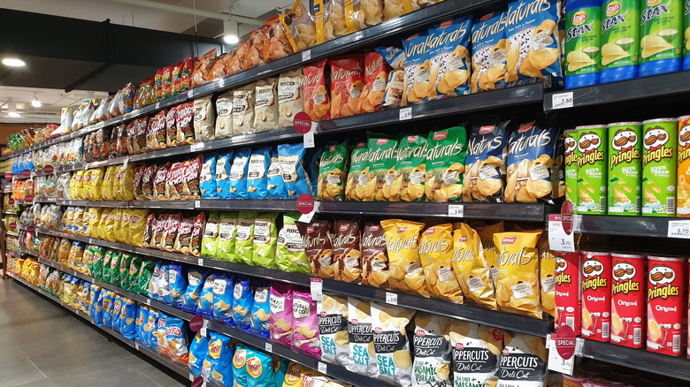 grocery store aisle filled with chips