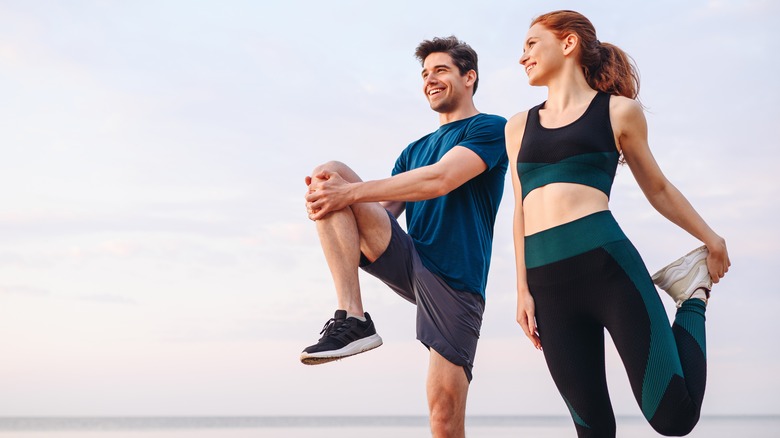 couple wearing workout clothes