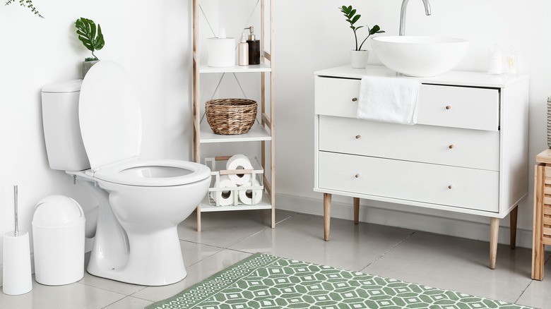 Bathroom with tan and green accents