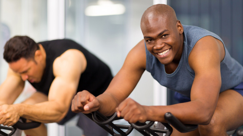 men taking spin class