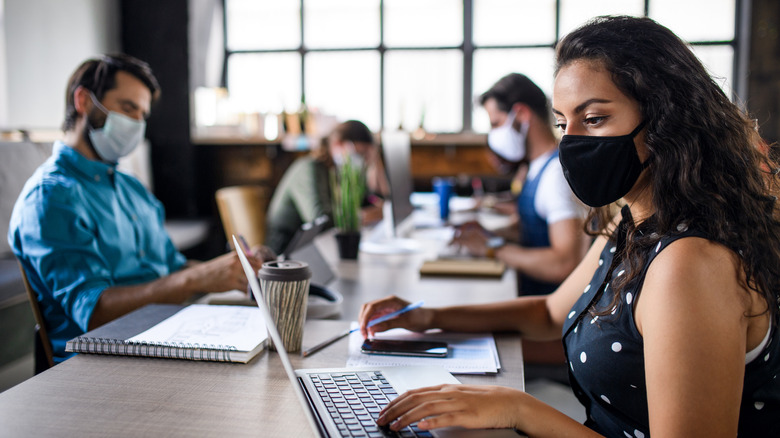 people working wearing masks