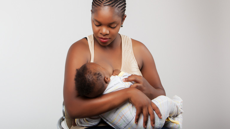 Woman breastfeeding her baby