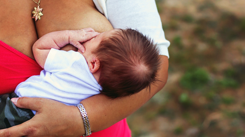 mother nursing baby