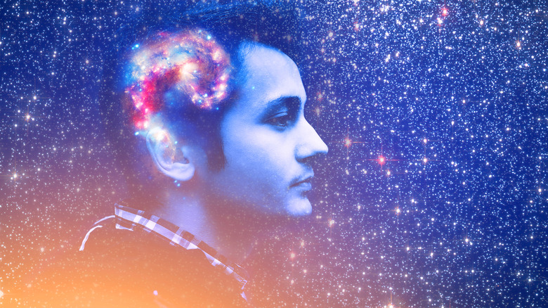 Man in sky with brain of stars